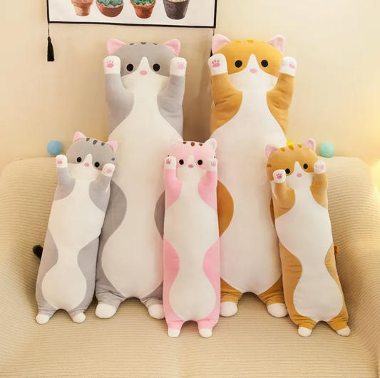 5  Furry Plush Cat Stuffed Animals Sitting on a couh